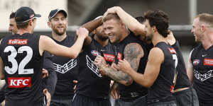 The Magpies share a laugh at training on Wednesday ahead of their preliminary final against GWS on Friday night.