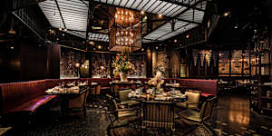 Inside Mott 32's clubby Hong Kong dining room.