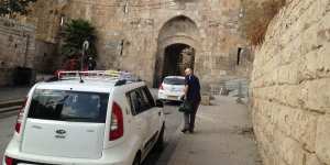 My father (right) approaching St Stephen's Gate,also known as the Lions'Gate,one of the entrances to Jerusalem's Old City in the occupied east of the capital.
