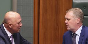 Defence Minister and Leader of the House Peter Dutton talks to Speaker Tony Smith during Question Time in May.