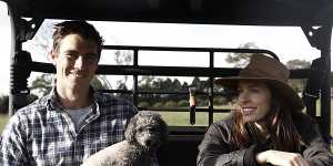 Cummins,fiancée Becky Boston and Norman the dog at the couple’s NSW Southern Highlands farm,to which they escape whenever possible.