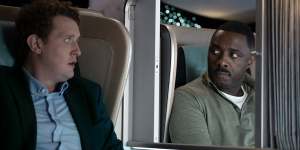 In the airborne thriller Hijack,Idris Elba (right) knows how to behave on plane. 