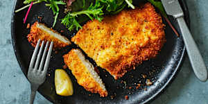 Golden,crunchy chicken cotoletta needs little more than lemon juice and fresh salad greens for company.
