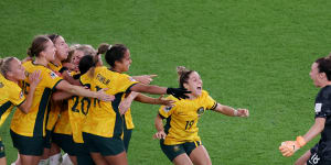 The Matildas celebrate winning the penalty shootout against France in the World Cup quarter-final.