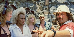 “There was absolutely nothing of the diva in her”:George Miller directs Tina Turner on the set of Mad Max Beyond Thunderdome.
