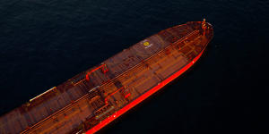 Oil tankers are seen anchored in the Pacific Ocean carrying crude oil no one will buy.
