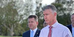 Queensland Sports Minister Tim Mander is facing questions after it was revealed he was enrolled to vote at property rented by a staffer. 