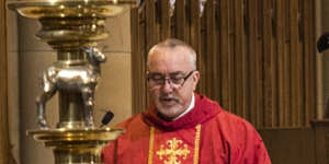 Father Don Richardson celebrates Mass at St Mary’s Cathedral in October.