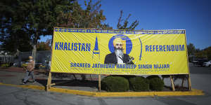 A photograph of the late Hardeep Singh Nijjar is seen on a banner outside the Guru Nanak Sikh Gurdwara Sahib in Surrey,British Columbia.