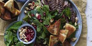 Grilled lamb salad with date paste,pomegranate and crunchy pita croutons.