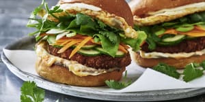Banh mi-inspired chicken burgers with soft fried eggs,pâté and pickles.