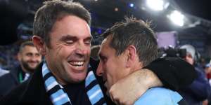 Hugging NSW coach Brad Fittler after winning the 2019 State of Origin decider.