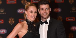 Brooke Cotchin,left,with her husband Trent Cotchin. 