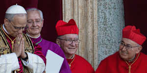 From left:Newly elected Pope Leo XIV with Archbishop Diego Giovanni Ravelli,Cardinal Pietro Parolin,and Cardinal Vinko Puljić.