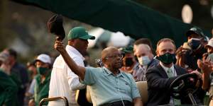 Lee Elder waves to fans at the Masters at Augusta this year.