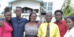 Shamar Joseph (second from left) with family members in Baracara.