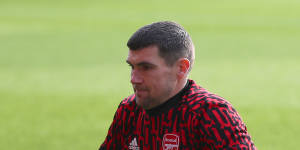 Socceroos star Mathew Ryan is waiting patiently for his chance at Arsenal,the club he grew up supporting in the EPL.