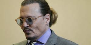 Actor Johnny Depp returns to the courtroom after lunch break at the Fairfax County Circuit Court.
