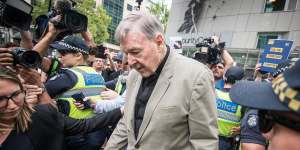 Cardinal George Pell leaving the County Court in Melbourne.