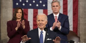 US President Joe Biden delivering his State of the Union address flanked by Vice President Kamala Harris and House Speaker Kevin McCarthy.