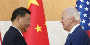 Chinese President Xi Jinping and US President Joe Biden shaking hands at the G20 last year.