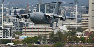 The C-17A Globemaster flys over Woolloongabba on Thursday afternoon in preparation for Riverfire.