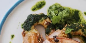 King prawns with green tomatoes and parsley. 