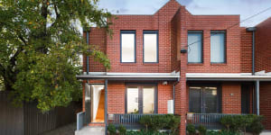 Modern Carlton North home sells for $1.615m in election day auction