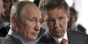 Vladimir Putin with Gazprom CEO Alexey Miller. Russian energy revenues continue to roll in.