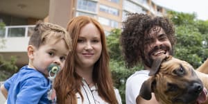 Willian Fonseca and Georgia Dawson with their son Rafy,aged two and a half,and their Staffy puppy Fav. They have just been told they will have to pay a $2000 bond to keep their dog inside their Artarmon apartment.