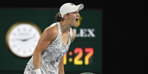 Ash Barty celebrates after defeating Danielle Collins. 