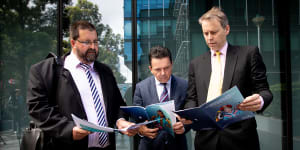 Troy Stolz,Nick Xenophon and Stephen Mayne outside the Annual General Meeting for Aristocrat Leisure.