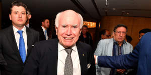 Former Australian Prime Minister John Howard arrives during the count at the Federal Liberal Reception at the Sofitel-Wentworth hotel in Sydney on Saturday night.