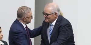 Scott Morrison and Anthony Albanese exchange a handshake (and a cowpat sandwich). 