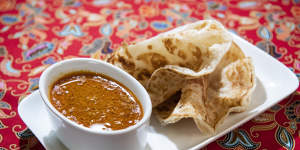 Roti canai and curry sauce.