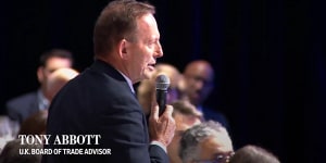 Former prime minister Tony Abbott confronts US House Speaker Mike Johnson from the audience of the WSJ CEO Council event in Washington. 