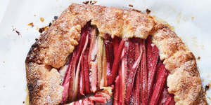 Rhubarb-almond galette from Dining In by Alison Roman,published by Hardie Grant Books RRP $48.