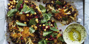 Thick cauliflower steaks slathered with a spicy harissa paste and roasted until caramelised.