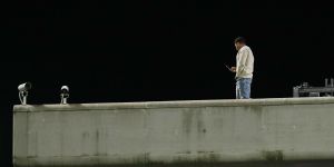 A man climbed onto the top of a stand at the SCG on Saturday night during the Australia and England rugby Test.