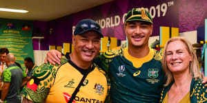 Jordan Petaia and his parents after Australia's 45-10 win over Uruguay at last year's Rugby World Cup.
