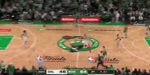 Payton Prtichard drains a three-pointer for Boston Celtics on the half-time buzzer in their game-five NBA finals match against the Dallas Maevericks.