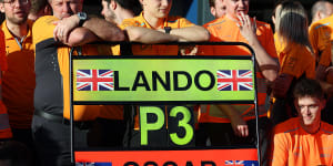 The McLaren chief executive officer Zak Brown with Oscar Piastri in pit lane after the team decided to prioritise Lando Norris in the Australian Grand Prix.