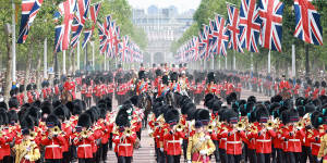 The royal family parades on horseback,centre,during Trooping the Colour last year.