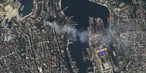 A satellite photo shows smoke billowing from the Russian Black Sea fleet headquarters in Sevastopol,Crimea,on Friday.