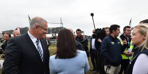 Prime Minister Scott Morrison and Liberal candidate Jessica Whelan campaigning near Launceston,Tasmania,on Thursday.