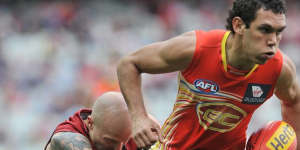 Harley Bennell,right,in action for the Suns. 