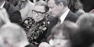 Ruth Bader Ginsburg chats with John Roberts,the Chief Justice of the Supreme Court,before a ceremony at the White House in 2018. 