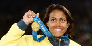 Cathy Freeman with her gold medal for the 400 metres.