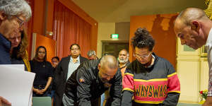Australian Indigenous community leaders sign the paperwork taking custody of six ancestors from the Grassi Museum of Ethnology in Leipzig,November 17,2022.