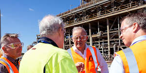 Prime Minister Anthony Albanese and Energy Minister Chris Bowen (left) at Ampol’s Lytton Oil Refinery in Brisbane on Thursday.